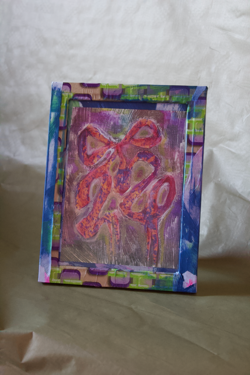 FRAMED RIBBON PAINTING